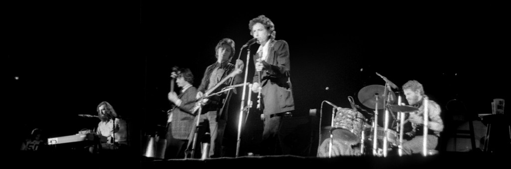 "Dylan and The Band" by Hugh Shirley Candyside - Flickr: Dylan and The Band. Licensed under CC BY-SA 2.0 via Wikimedia Commons